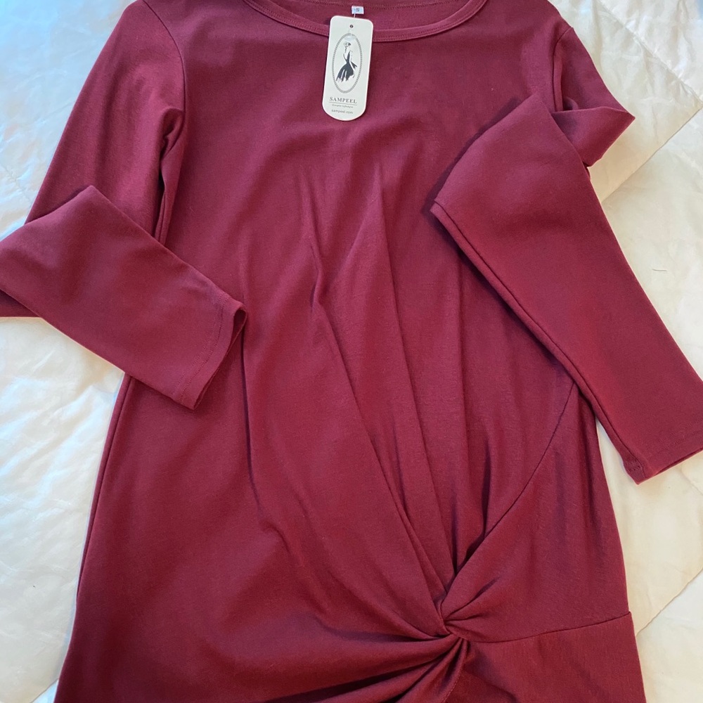 Long burgundy thick top. Cute with leggings